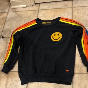 Aviator Nation Black Sweatshirt with Yellow Smiley and Rainbow Sleeves
